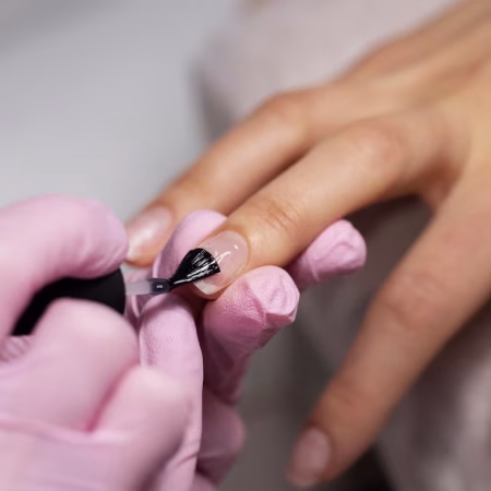 nail-art-professional-working-client-nails_23-2149265934